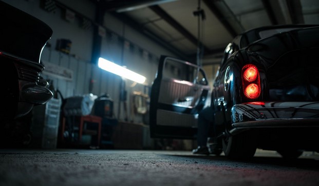 car parked inside of a garage