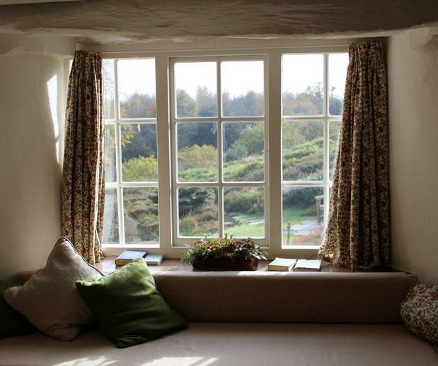 beautiful green landscape behind a window